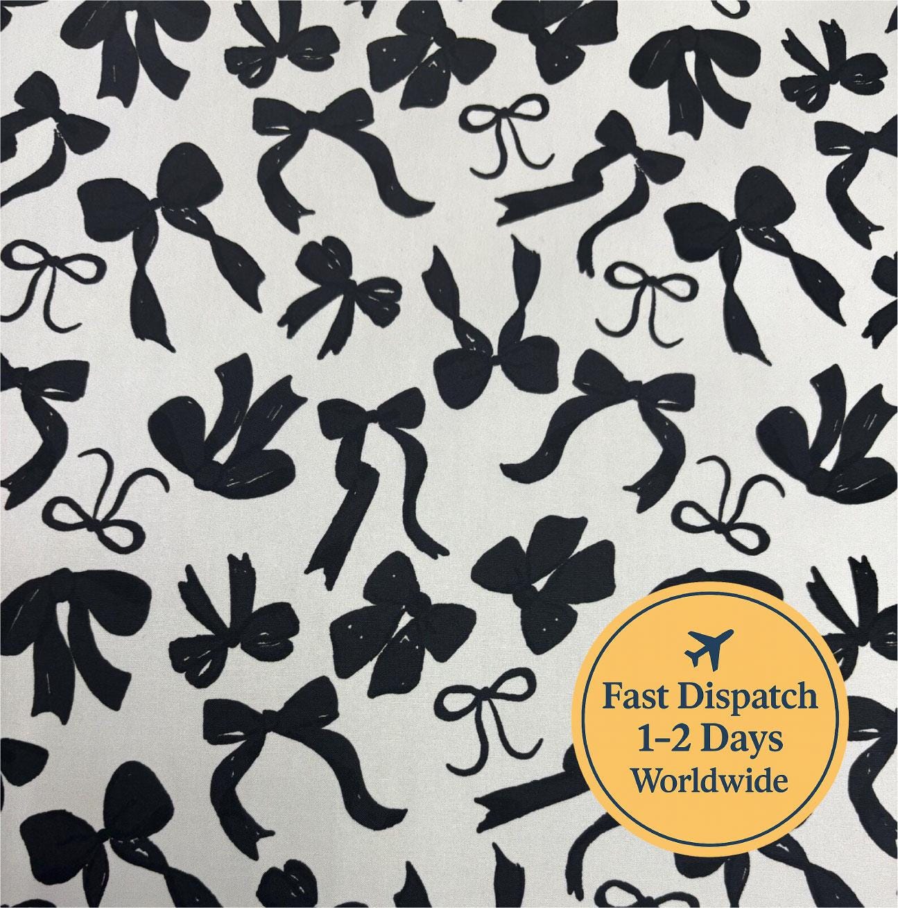 Black Bows Cotton Fabric